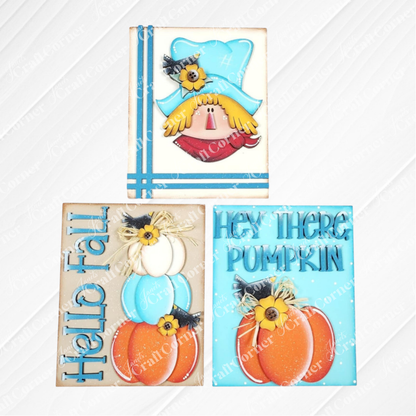 Janet's Craft Corner Fall Switchable Farmhouse Signs DIY kit lets you create seasonal decor with 9 designs, including a blue scarecrow, “Hello Fall” stacked pumpkins, and an orange pumpkin with sunflowers. Set of 1.