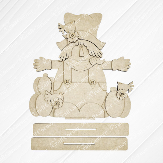 Janet's Craft Corner Fall Scarecrow Shelf Sitter is a DIY seasonal home decor craft kit (set of 1) featuring a rustic scarecrow with hat, scarf, and patch details—perfect autumn decor for your shelf.