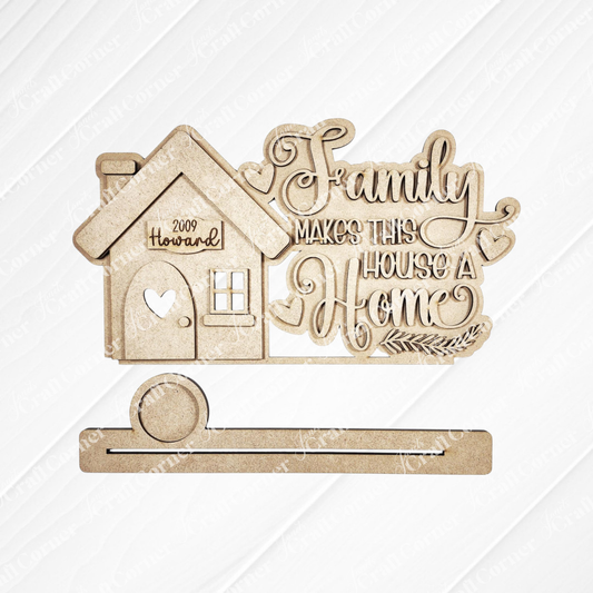 The Family Home Word Art Votive Holder Shelf Sitter by Janet's Craft Corner is a DIY home decor kit shaped like a house, engraved with “Howard,” “2009,” and “Family makes this house a home”—perfect for personalized word art projects. Set of 1.