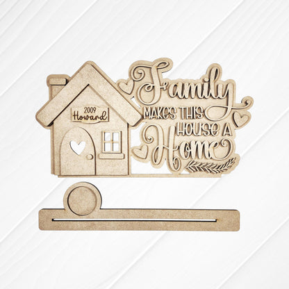 The Family Home Word Art Votive Holder Shelf Sitter by Janet's Craft Corner is a DIY home decor craft kit featuring layered word art, hearts, and leafy accents—perfect for charming, personalized décor. Set of 1.