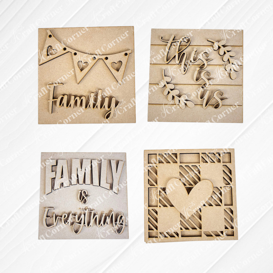 Janet's Craft Corner’s Family Home Squares set includes four laser-cut wooden plaques: a "Family" banner, "this is us" with leaves, "Family is Everything," and a checkered heart—perfect for tiered tray decor.