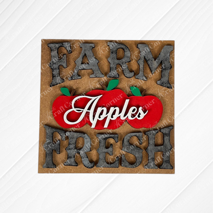 Janet's Craft Corner Farm Fresh Apples Square: A rustic sign reading "FARM FRESH" with "Apples" in cursive above three red apples and green leaves, perfect as a charming DIY seasonal home decor accent for small spaces.