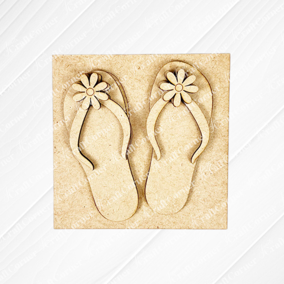 Add a touch of summer with Janet's Craft Corner Summer Lovin Swappable Squares DIY kit—a pair of light wood flip-flops with daisy flower straps, perfect as cut-outs for seasonal home decor or tiered tray displays.
