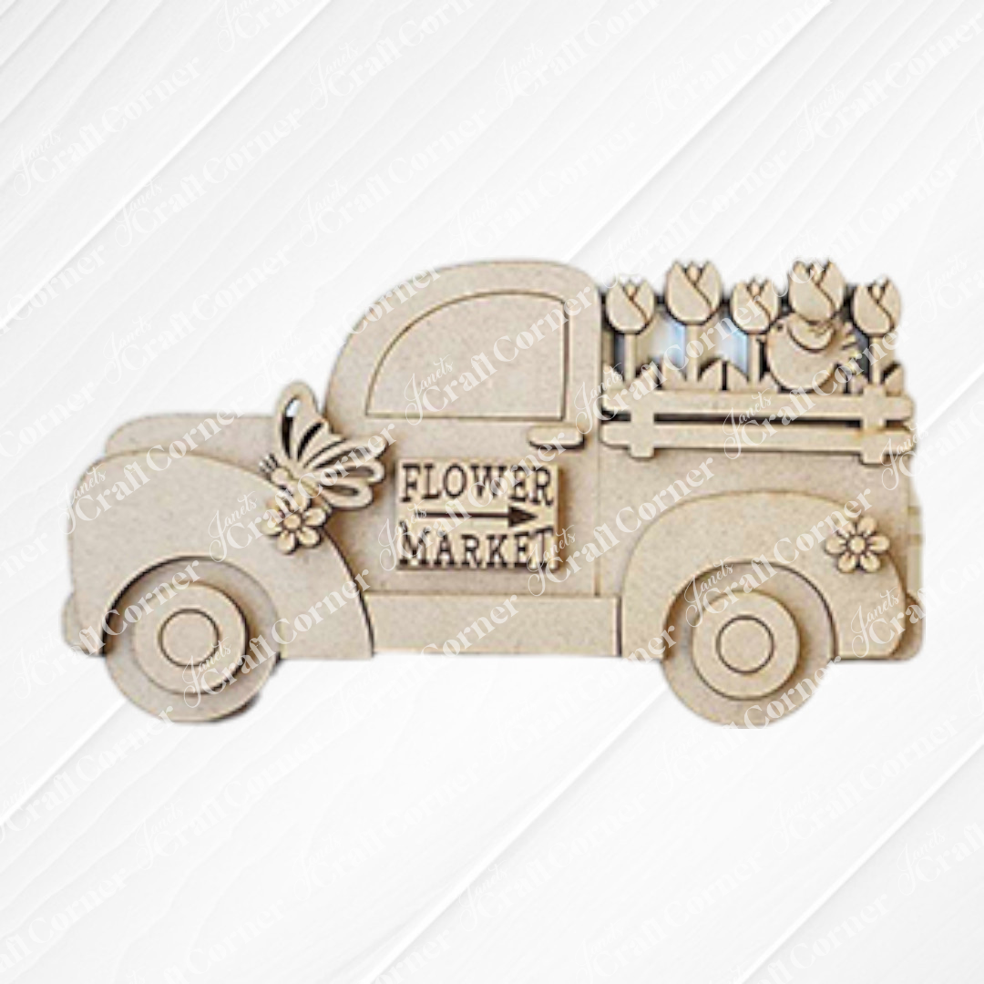 The Hello Spring Decor Set by Janet's Craft Corner includes 5 wooden pieces—a vintage truck with "Flower Market" and floral accents—ideal as farmhouse decor or a fun DIY craft kit for spring decorating.