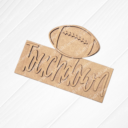 Janet's Craft Corner Football Decor Set is a DIY craft kit with a football-shaped wooden sign and "Touchdown" in white script—perfect for tiered tray displays or as Football Mini Shelf Sitters. Choose from 5 creative options!.