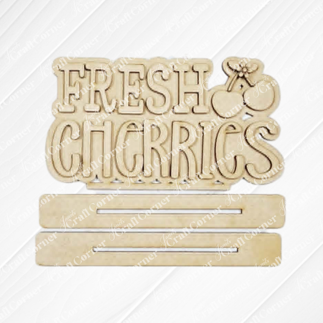 The Cherry Decor Set by Janet's Craft Corner features a wooden "FRESH CHERRIES" sign with a cherry illustration and two blank spaces for customization—ideal as a farmhouse accent or DIY craft for your home decor kit.