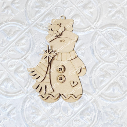 Janet's Craft Corner Gingerbread Ornaments: DIY holiday craft kit set of 8—perfect for festive décor or crafts. Shown on an embossed white surface.