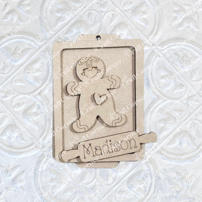 Janet's Craft Corner Gingerbread Ornaments - DIY holiday craft kit (Set of 8) features wooden gingerbread figures with heart details and customizable nameplates, perfect for festive décor.