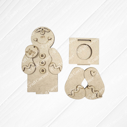 Introducing Janet’s Craft Corner’s Snowman & Gingerbread Votive Holder Shelf Sitter – a DIY home decor craft kit (set of 1) featuring laser-cut MDF pieces, including a “Joy” ornament, buttons, heart shapes, and a square stand for simple assembly. Perfect as charming Christmas shelf decor, all components are shown on a light background and create delightful votive holder shelf sitters for your holiday home.