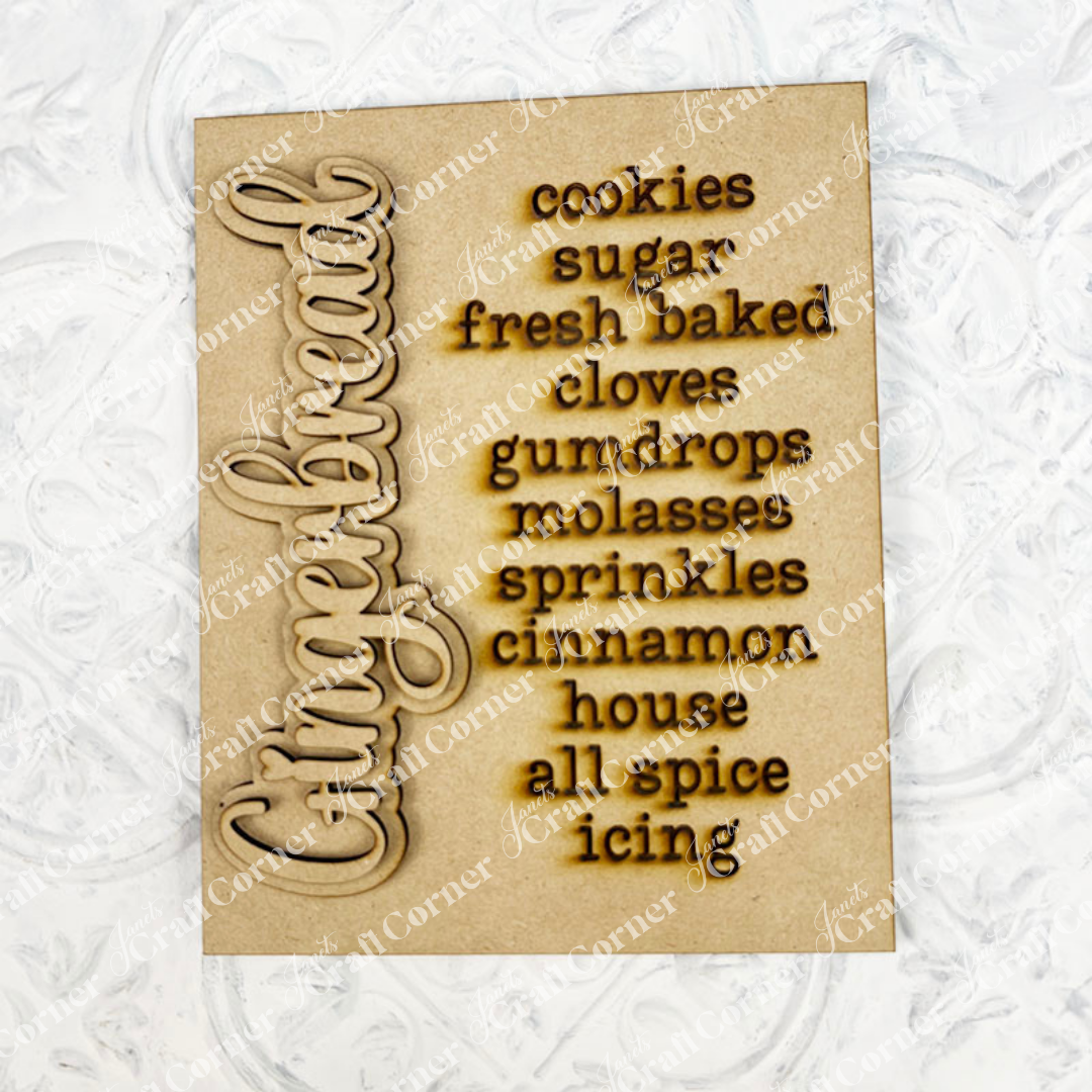 The Gingerbread Words Farmhouse Sign by Janet's Craft Corner is a beige DIY seasonal home decor craft kit featuring "Gingerbread" in cursive and cookie themed words—perfect for creative spaces or as unique wall art.