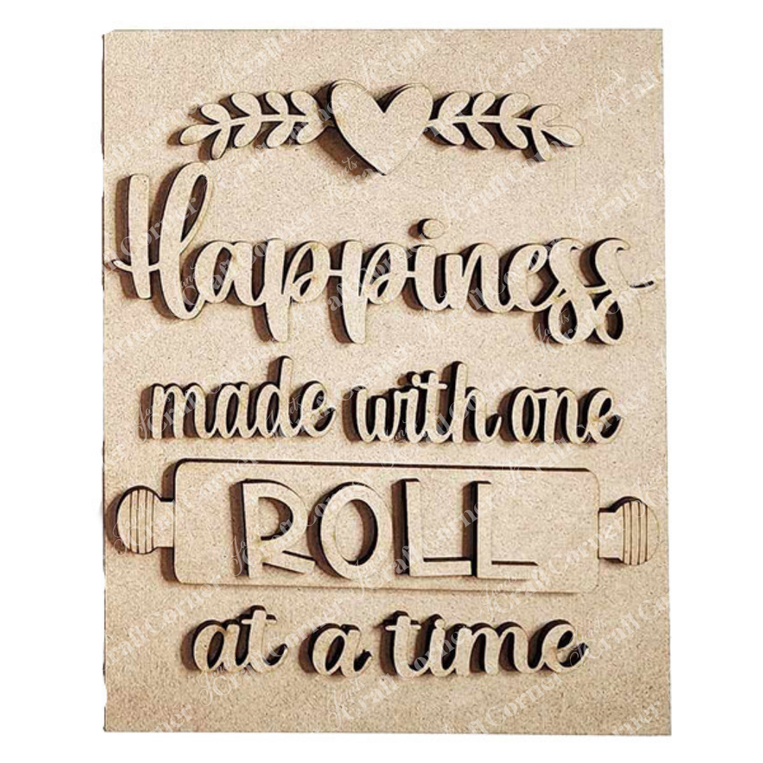 Janet's Craft Corner Kitchen Switchable Farmhouse Sign features "Happiness made with one roll at a time" with a heart, leaves, and rolling pin—ideal rustic DIY home decor to warm up your kitchen. Set of 1 craft kit.