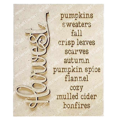 Decorative sign with autumn-themed words on a wood background