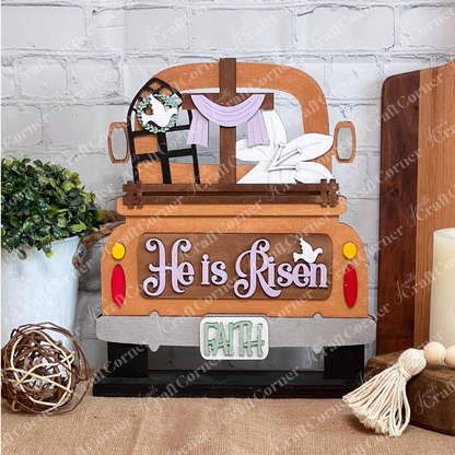 Janet's Craft Corner offers the Antique Truck Base with Insert, a DIY interchangeable home decor kit. Featuring "He is Risen" in purple letters, a cross, window wreath, and "FAITH" on the bumper, it adds a spiritual touch to any rustic setting. Ideal for enhancing your home decor.