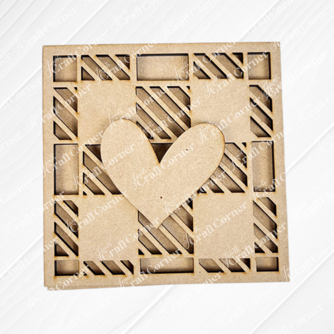 The Family Home Squares by Janet's Craft Corner features a square MDF with geometric wood cut-outs and a large heart in the center, ideal for tiered tray decor, showcased on a white wooden background.