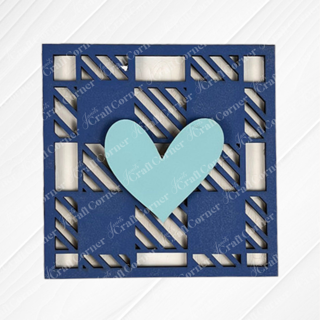 Family Home Squares by Janet’s Craft Corner is a blue square card with a geometric cutout pattern and a large light blue heart in the center, displayed on a white textured background.