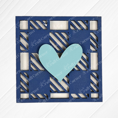 Family Home Squares by Janet’s Craft Corner is a blue square card with a geometric cutout pattern and a large light blue heart in the center, displayed on a white textured background.