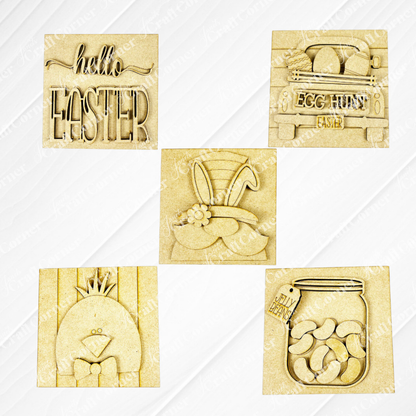Hello Easter Squares by Janet's Craft Corner features five wooden plaques with festive designs—Hello Easter text, egg hunt truck, bunny in a hat, chick, and jelly bean jar—ideal wood cut-outs for your next DIY craft kit!.