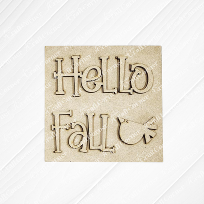 The Fall Scarecrow Squares by Janet's Craft Corner is a laser-cut wooden sign featuring “Hello Fall” and a simple bird graphic—ideal for adding seasonal warmth to your home décor.