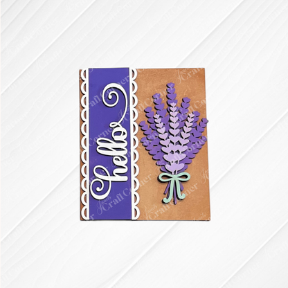 Janet's Craft Corner's Lavender Switchable Farmhouse Signs DIY kit includes a handmade sign with a purple "hello" strip, scalloped edges, and lavender paper flowers tied with a mint bow—ideal for small space decor or tiered tray displays.