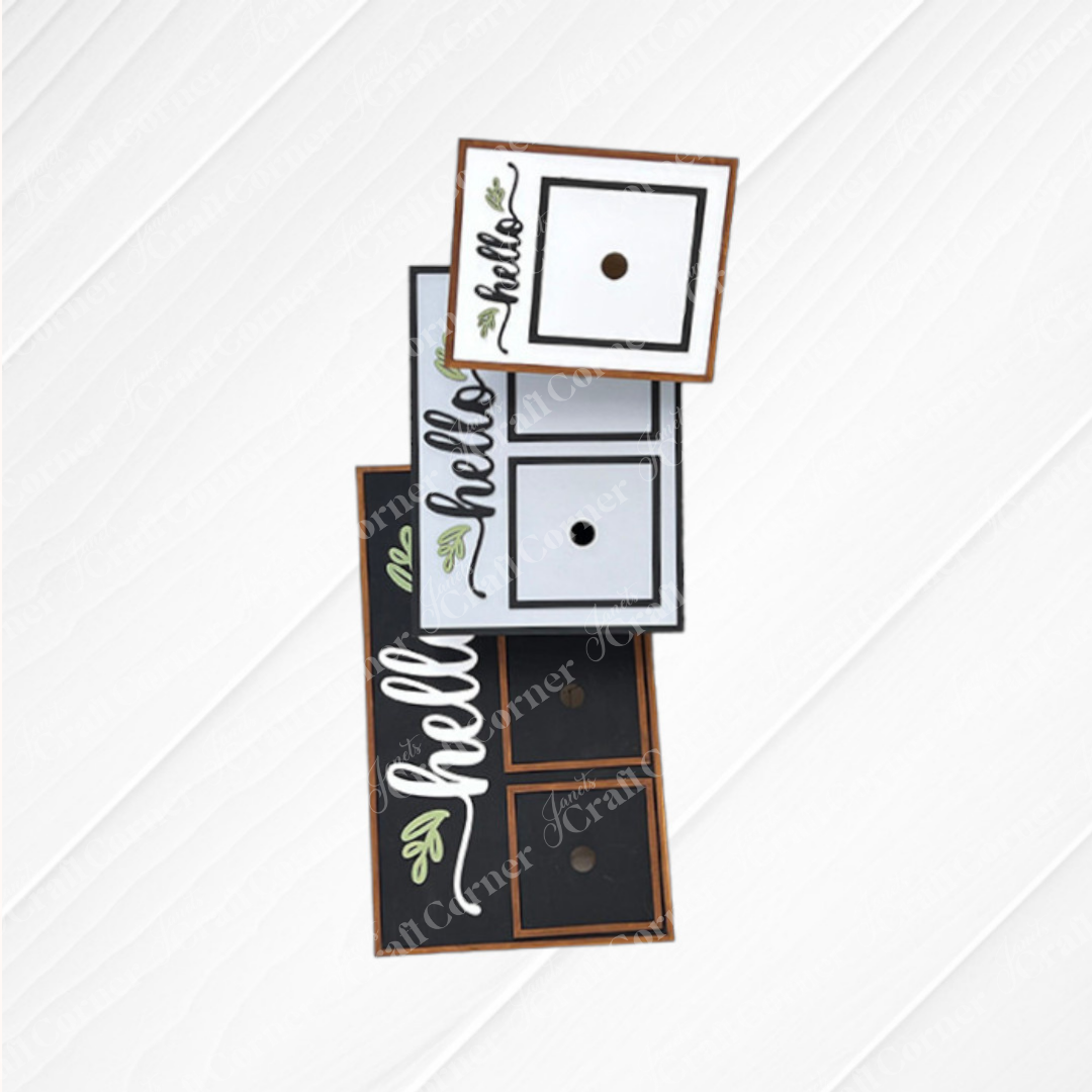 Four square greeting cards with "hello" in cursive and leafy designs, stacked diagonally. Pair these with the Hello Swappable Squares Holder - DIY Craft Kit from Janet's Craft Corner to create stylish seasonal displays or use as shelf sitters.