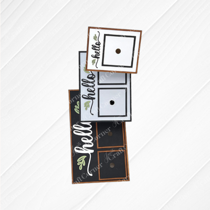 Four square greeting cards with "hello" in cursive and leafy designs, stacked diagonally. Pair these with the Hello Swappable Squares Holder - DIY Craft Kit from Janet's Craft Corner to create stylish seasonal displays or use as shelf sitters.