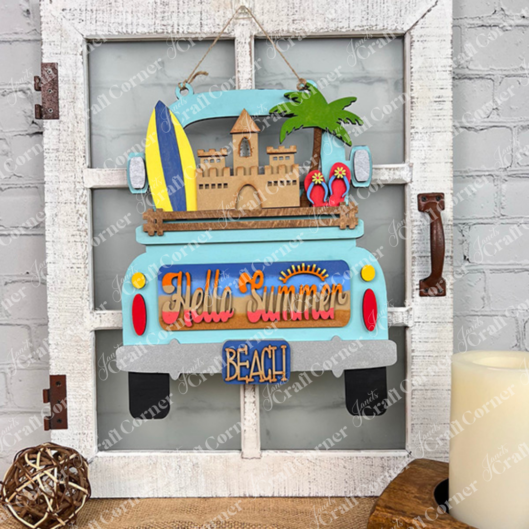 Janet's Craft Corner presents the Antique Truck Base with Insert. This beach-themed DIY craft kit features a "Hello Summer" car, surfboard, sandcastle, palm tree, and flip-flops. Perfect for interchangeable decor alongside kitchen cutting boards and a candle.
