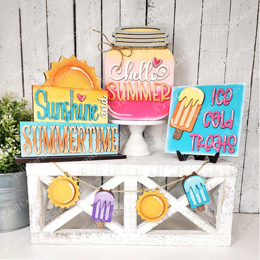 Create a charming summer display with Janet's Craft Corner's Hello Summer Tiered Tray Set, featuring a decorative wooden crate filled with delightful signs and cutouts. The set includes images of a sun, ice cream, and a mason jar labeled "Hello Summer." Enjoy the playful signs that read "Sunshine and Summertime" and "Ice Cold Treats," complemented by small banners of suns and popsicles for the perfect seasonal decor.