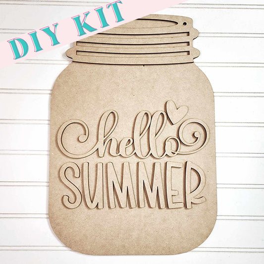 This adorable Hello Summer Mason Jar Door Hanger from Janet's Craft Corner is perfect for brightening up your home décor. Featuring a mason jar shape with "Hello Summer" and a small heart, set against a white, striped background, it makes a charming addition to any space.