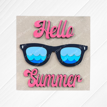 The Summer Lovin Swappable Squares DIY craft kit from Janet's Craft Corner features a "Hello Summer" card with pink text and black sunglasses on a light background—ideal for tiered tray decor or your Swappable Squares display.