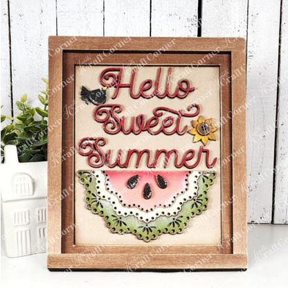 Janet’s Craft Corner Vintage Watermelon Switchable Farmhouse Sign DIY kit features “Hello Sweet Summer” in red and pink script with a watermelon slice, sunflower, and black bird—perfect for seasonal home decor. Set of 1.