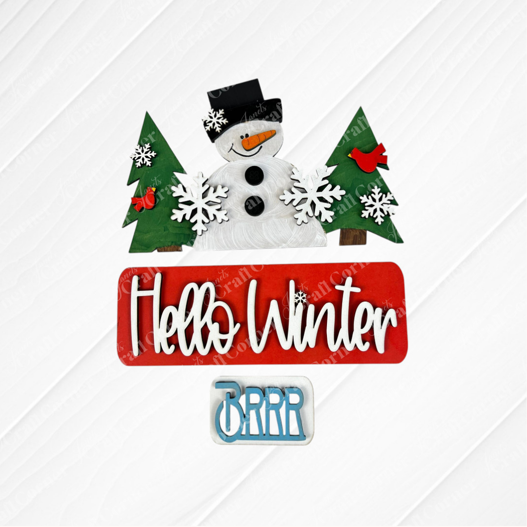 Transform your home this festive season with Janet's Craft Corner's "Hello Winter Interchangeable Insert - Painted." This winter-themed decor showcases a cheerful snowman adorned with a black hat, set amidst vibrant green pine trees, charming red cardinals, and delicate white snowflakes. The design features a prominent red sign reading "Hello Winter" alongside a smaller "BRRR" sign, making it an ideal addition for interchangeable inserts on antique truck bases.