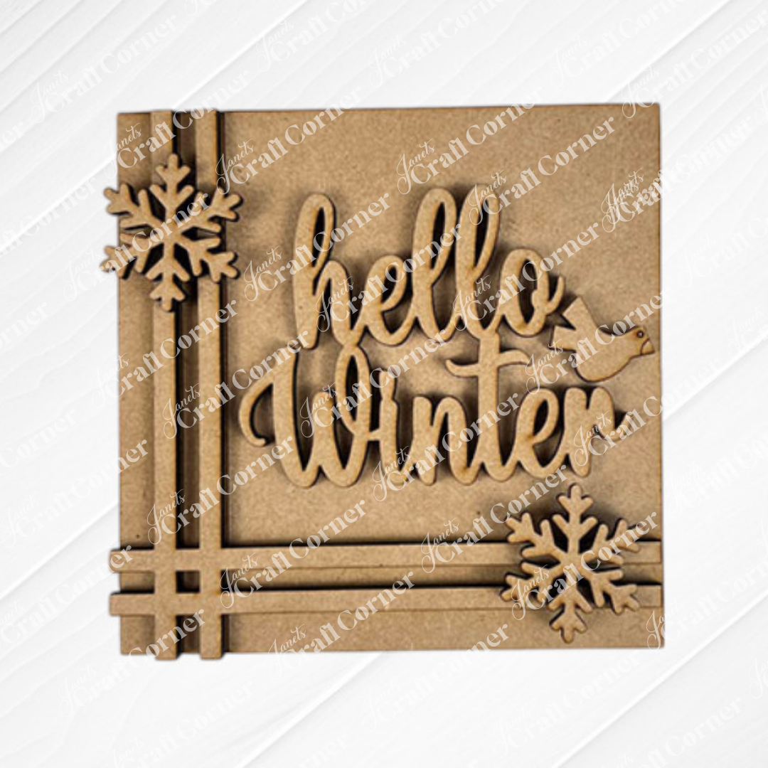 Janet's Craft Corner’s “Hello Winter Squares” features a wooden sign with cursive text, two snowflakes, and a bird on a white background—ideal for seasonal home decor kits or tiered tray displays.