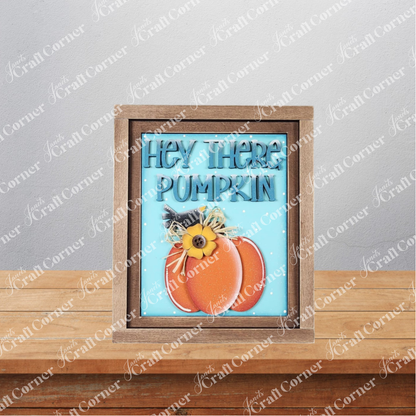 The Fall Switchable Farmhouse Signs DIY craft kit from Janet's Craft Corner features a framed "Hey there pumpkin" sign on a blue background—perfect as seasonal decor or inspiration for your next autumn project.