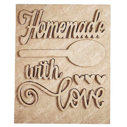 The Kitchen Switchable Farmhouse Sign by Janet's Craft Corner is a DIY home decor craft kit featuring "Homemade with love," a large wooden spoon, and hearts—a charming rustic accent to warm up your kitchen.