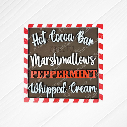 Janet's Craft Corner offers Hot Cocoa Squares—a festive wood sign with a red and white striped border and playful red and white lettering—perfect for DIY seasonal home decor.