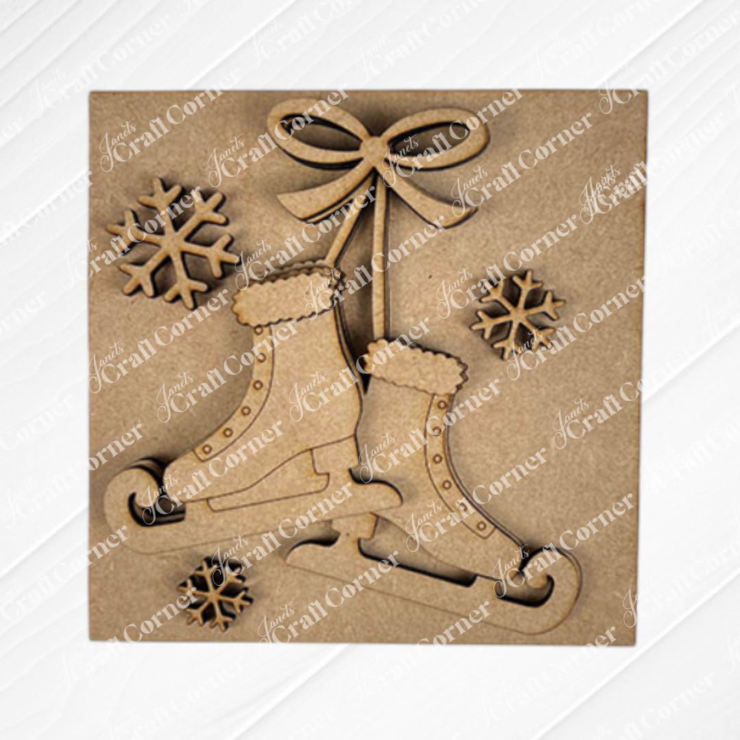 The "Hello Winter Squares" by Janet's Craft Corner is a laser-cut wooden ornament with two ice skates tied with a bow and snowflakes, ideal as seasonal home decor or to enhance your tiered tray display.