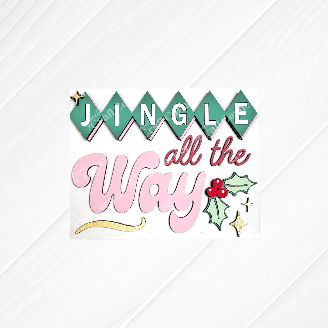 Janet's Craft Corner Merry Midcentury Modern Switchable Farmhouse Sign features green diamonds spelling "JINGLE" above pink "all the Way" script, holly, berries, gold accents & a white background—perfect for DIY seasonal home décor craft kits.