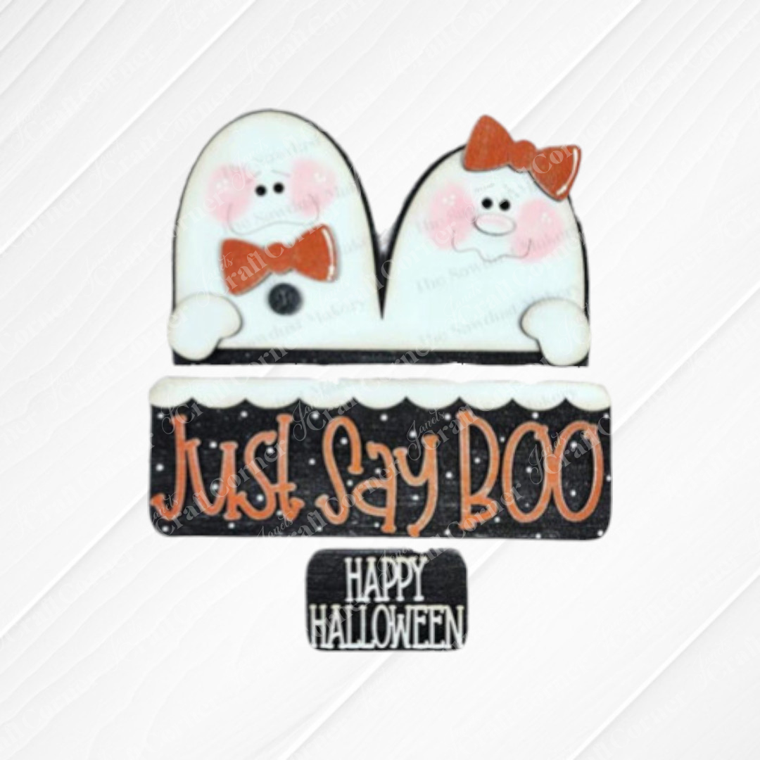 Janet's Craft Corner's Just Say Boo Interchangeable Insert craft kit includes two ghost with orange bows and signs that say "Just Say Boo" and "Happy Halloween"—perfect DIY Halloween decor or insert for your home, featuring three cute pieces on a white wood background.