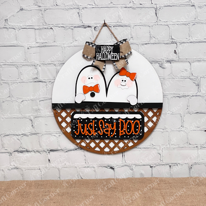 Janet's Craft Corner's Just Say Boo Interchangeable Insert craft kit includes two ghost with orange bows and signs that say "Just Say Boo" and "Happy Halloween"—perfect DIY Halloween decor or insert for your home, featuring three cute pieces displayed on a white door hanger base.