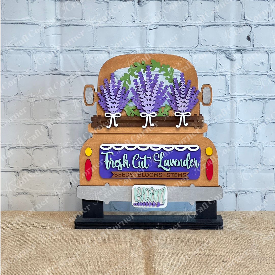 Janet's Craft Corner's Lavender Interchangeable Insert DIY Craft Kit features a vintage truck with lavender and the sign "Fresh Cut Lavender: Seeds • Blooms • Stems," perfect for farmhouse or lavender-themed home décor.