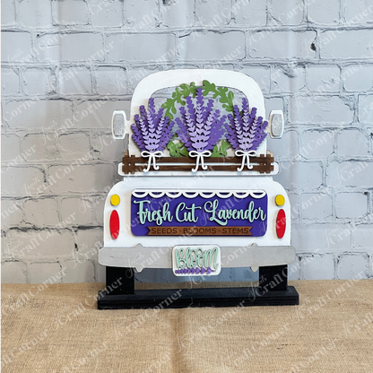 The Lavender Interchangeable Insert – DIY Craft Kit by Janet's Craft Corner features a white vintage truck loaded with purple lavender and reads "Fresh Cut Lavender: Seeds - Blooms - Stems" and "Bloom"—perfect for farmhouse or lavender décor.