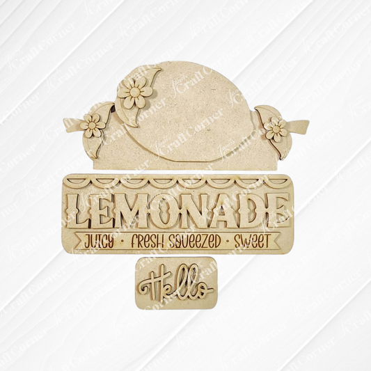 The Lemon Interchangeable Insert by Janet's Craft Corner is a 3-piece DIY seasonal home decor craft kit, featuring a lemon shape with flowers and fun lemonade-themed text—perfect for adding charm to your space.