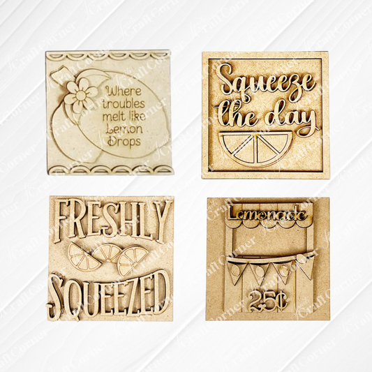 Lemon Squares by Janet's Craft Corner offers four decorative beige tiles with lemon-themed designs and text—an ideal DIY seasonal home decor craft kit, perfect for brightening your space with cheerful, interchangeable accents.