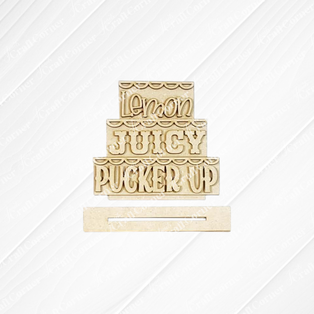 The Lemon Decor Set by Janet's Craft Corner features a three-layered wooden sign reading "Lemon JUICY PUCKER UP" in fun fonts, plus a separate rectangular piece—perfect for DIY farmhouse decor on any textured background.