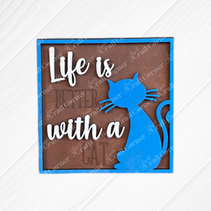 Janet's Craft Corner Cat Swappable Squares features a wooden sign with a blue cat silhouette, “Life is better with a cat”—perfect DIY rustic home decor.