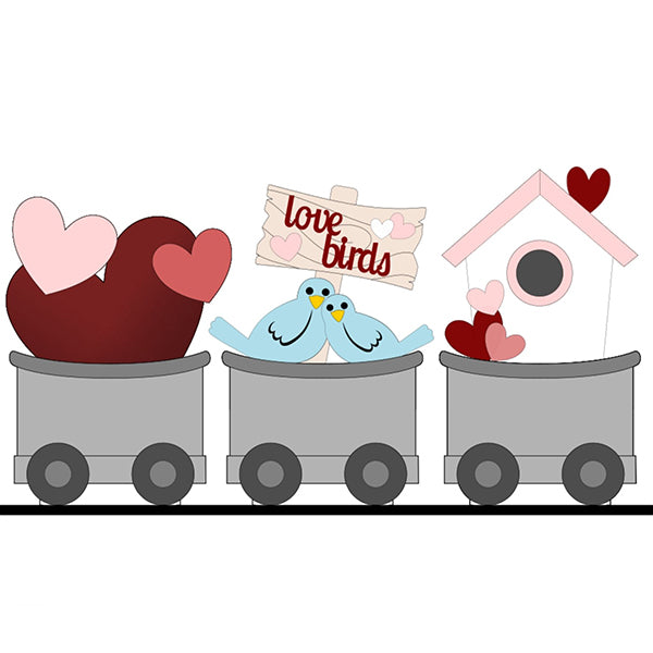 Illustration of the Love Birds Train Inserts from Janet's Craft Corner, featuring an interchangeable shelf sitter with three cars. Each car carries hearts, with the middle car displaying two blue birds and a "love birds" sign. The final car highlights a pink birdhouse decorated with hearts, ideal for Valentine's inserts in your DIY Kit.