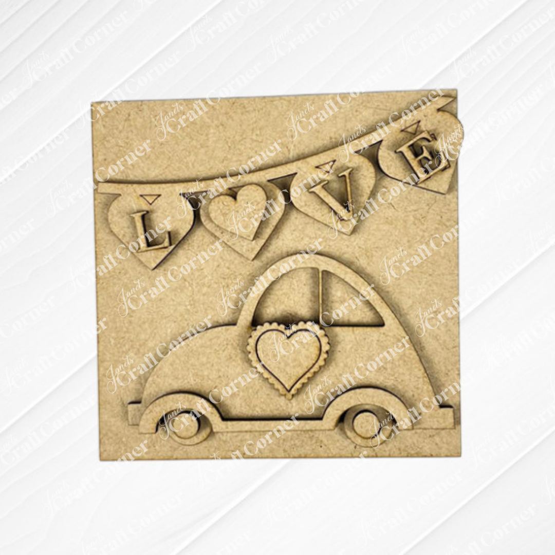 The Valentine Squares kit from Janet's Craft Corner features a car with heart shapes and a "LOVE" bunting—each letter in a heart. Ideal as DIY seasonal or tiered tray decor, it adds charm to neutral home backgrounds.