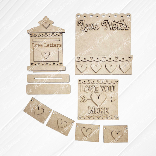 Explore Janet's Craft Corner's Valentine Love Letters Decor Set, ideal for home décor. This DIY craft kit includes delightful elements like a mailbox shape, small hearts, and hanging banners with designs such as "Love Notes" and "Love You More" to personalize your space.