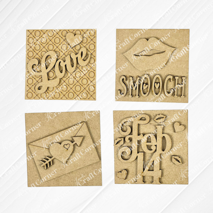 Janet's Craft Corner Love Squares: four wooden plaques with Valentine's cut-out designs—"Love" with a heart, lips with "Smooch," a love letter, and "feb 14." Perfect for seasonal decor or as a DIY craft kit.