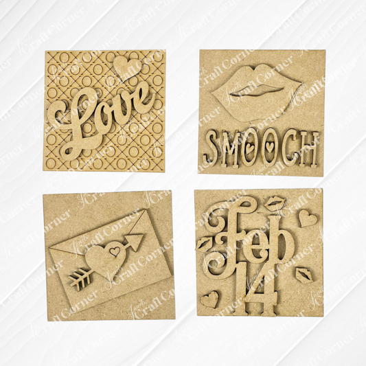 Janet's Craft Corner Love Squares: four wooden plaques with Valentine's cut-out designs—"Love" with a heart, lips with "Smooch," a love letter, and "feb 14." Perfect for seasonal decor or as a DIY craft kit.